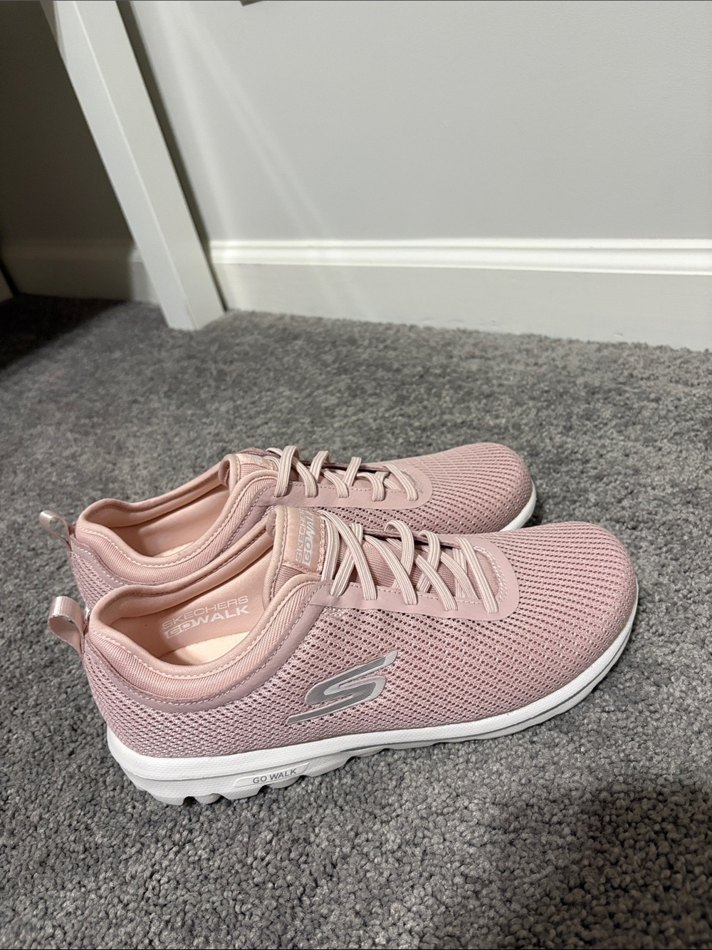 Skechers GOwalk walking shoes in a blush pink color
